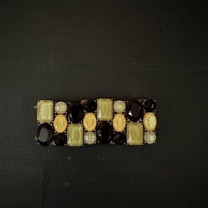 Elegant Gold and Black Women's Jewelry Piece